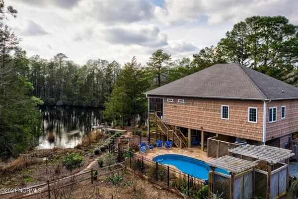 Photo 1 - River Road Retreat - Heated Pool & Hot Tub, Pond, Games, Fishing, >10 min to beach!