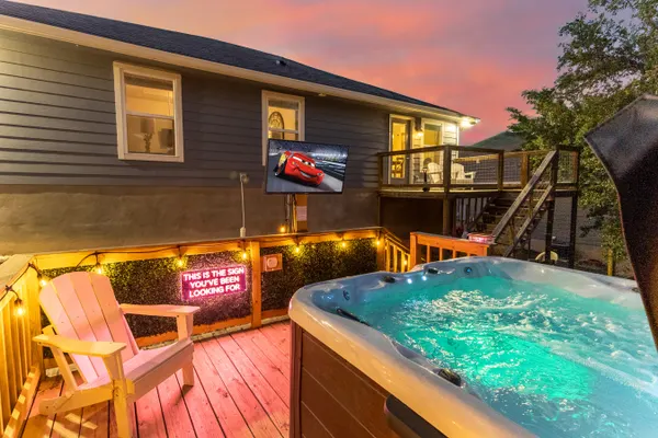 Photo 1 - Neon Vibes • Outdoor TV • Hot Tub • Arcade Room