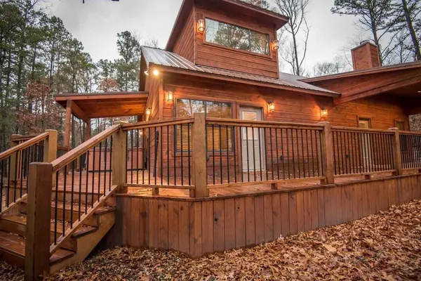 Photo 1 - All Decked Out Cabin in the Woods With Fireplace, Bbq, and Swing Bed by Redawning