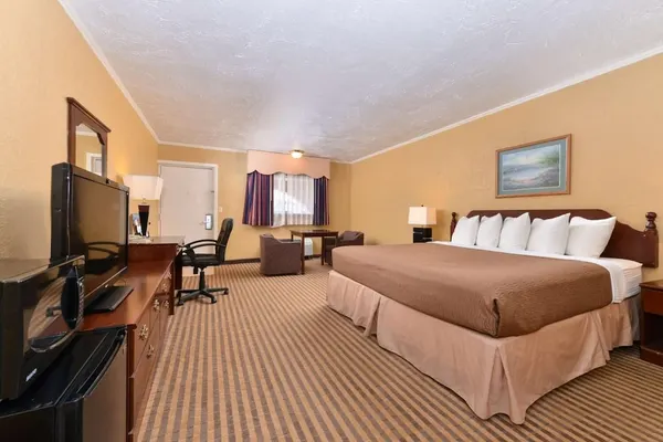 Photo 1 - Executive Plus Inn & Suites