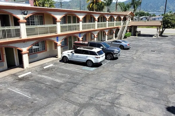 Photo 1 - Delmonico Inn & Suites