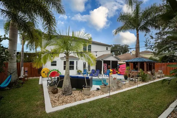 Photo 1 - Gorgeous Urban Oasis W/hot Tub, Heated Pool And Private Movie Theater 3 Bedroom Home by RedAwning
