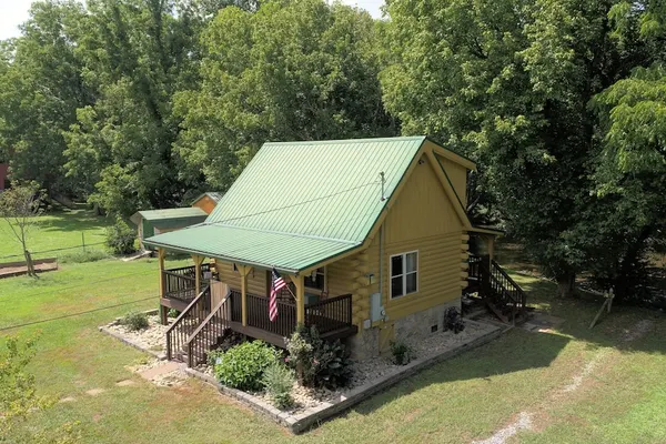 Photo 1 - Yellow Cabin on the River