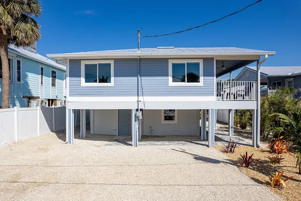 Photo 1 - Welcome To Ostego Beach Vacation Rental - 253 Ostego 4 Bedroom Home by RedAwning
