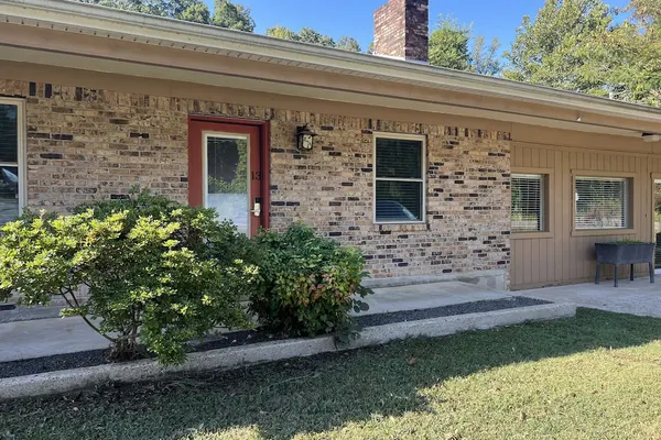 Photo 1 - Two bedroom House with fenced in yard, covered patio area, located at the Joplin Inn at the entrance to Mountain Harbor, just 1 1/2 miles from Lake Ouachita. by RedAwning