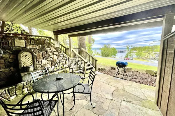 Photo 1 - SU15, Spacious studio with full kitchen, dining table and rock patio overlooking Lake Ouachita. by RedAwning