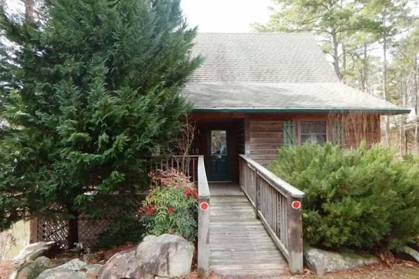 Photo 1 - Luxury, loft, log-sided two bedroom Harbor North cottage on Lake Ouachita. by RedAwning