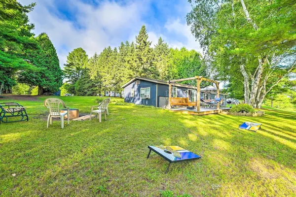 Photo 1 - Riverfront Home w/ Dock ~ 6 Mi to Cheboygan!