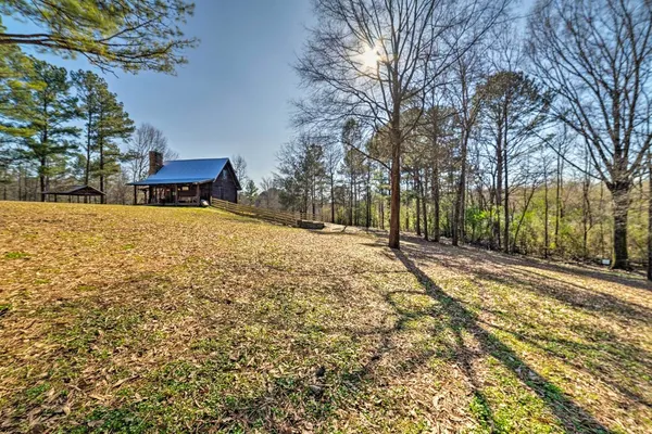 Photo 1 - Secluded Cabin w/ Fishing Pond Near Hunting!