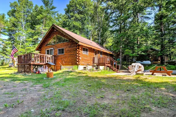 Photo 1 - Cozy Manistique Cabin w/ Deck, Grill & Fire Pit!