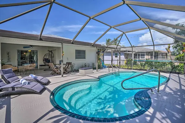 Photo 1 - Naples Oasis w/ Screened Pool, Bike to Beach!