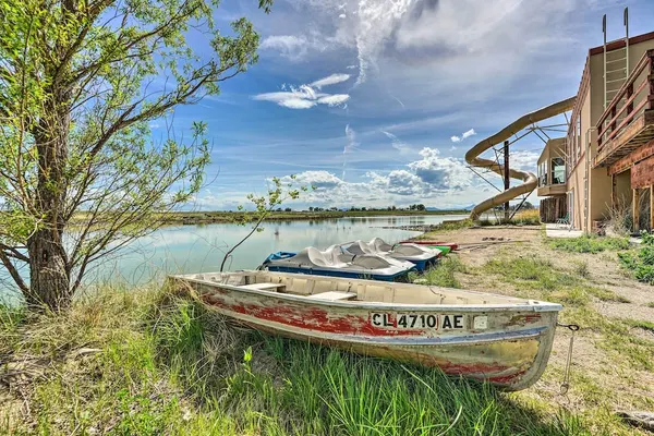 Photo 1 - Lakefront Country Home w/ Waterslide & Trampoline!