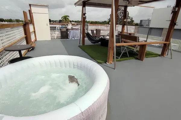 Photo 1 - Cozy and Modern Apartment Black & White With Jacuzzi on Terrace