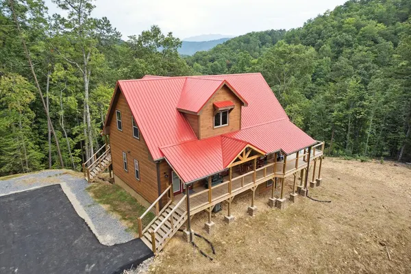 Photo 1 - Hidden Cove Chalet 5 Bedroom Cabin by RedAwning