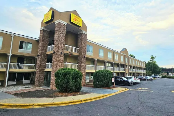 Photo 1 - Studios & Suites 4 Less Charlotte