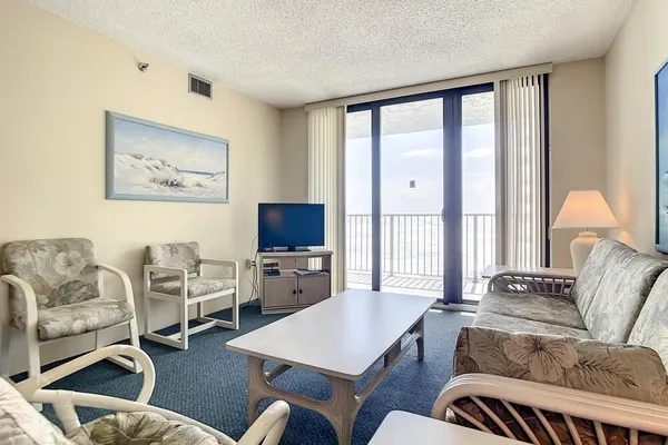 Photo 1 - Ocean View With a Beachfront Pool at Ocean Trillium Condo 402