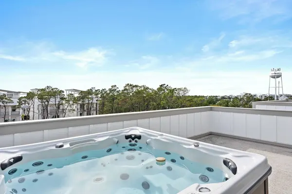 Photo 1 - Sea Dweller by Avantstay Rooftop Spa + Gulf View Golf Cart, Pool