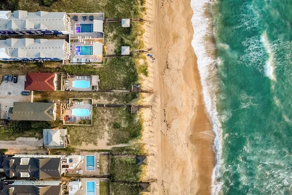 Photo 1 - Sleeps 28 Beachfront w/ Pool, Hot Tub, Game Room Atlantic Watch by Avantstay