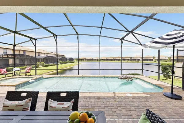 Photo 1 - Sleeps 20! Resort Home Near Disney, Pool+game Room Twice-as-nice by Avantstay