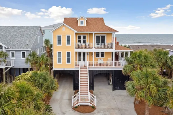 Photo 1 - Oceanfront w Pool Panoramic Deck Views 5bdr Folly Ocean Breeze by Avantstay