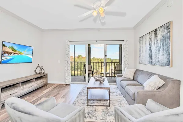 Photo 1 - Modern 2BR Condo w Private Patio7 min to Disney