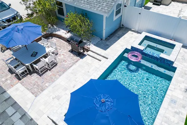 Photo 1 - NEW Beach Envy 4BR Pool Spa Steps From Sand