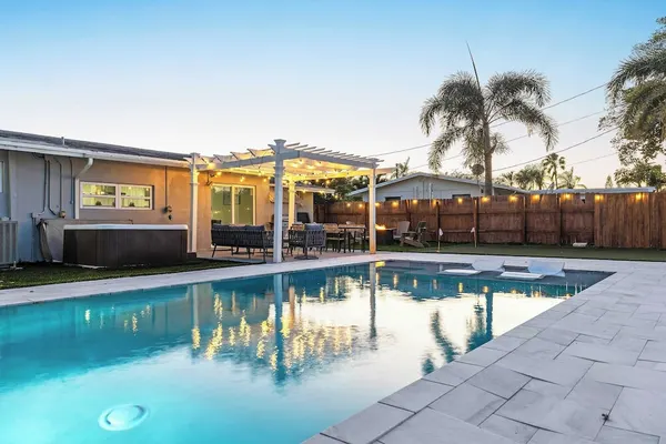 Photo 1 - Pool, Hot Tub & Putting Green Near Deerfield Beach Oasis on Fourth by Avantstay