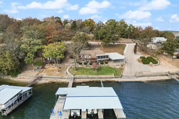 Photo 1 - Newly Updated Interior, Sunroom w/ Hot Tub, Deck, Deep Water Dock, Boat & PWC Slips