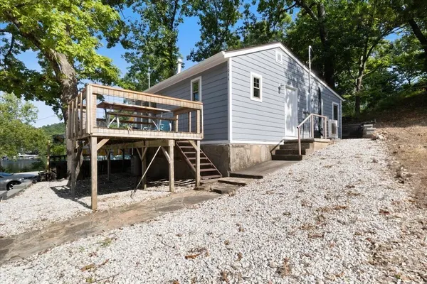Photo 1 - Lakefront Home in a Quiet Cove, Private Dock, Outdoor Dining & Fishing