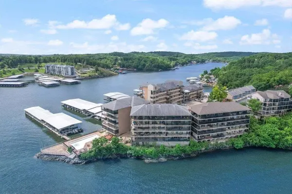 Photo 1 - 2mm Main Channel Views, Boat & PWC Slip, 2 Pools, Playground & Tennis