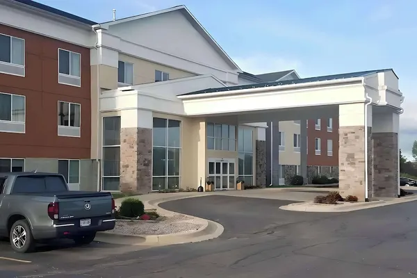 Photo 1 - Peach Tree Inn and Suites