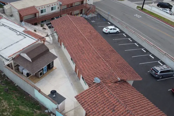 Photo 1 - New American Inn and Suites