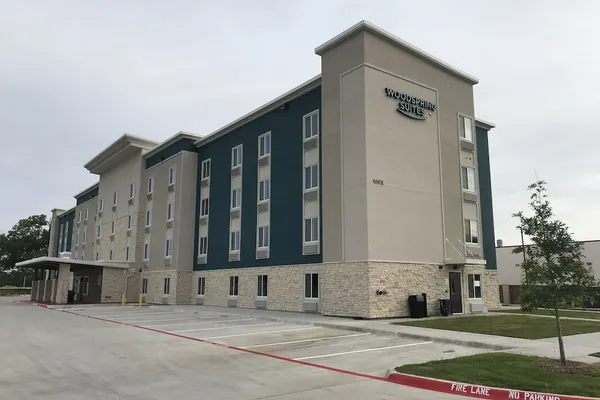 Photo 1 - WoodSpring Suites Dallas Plano Central Legacy Drive