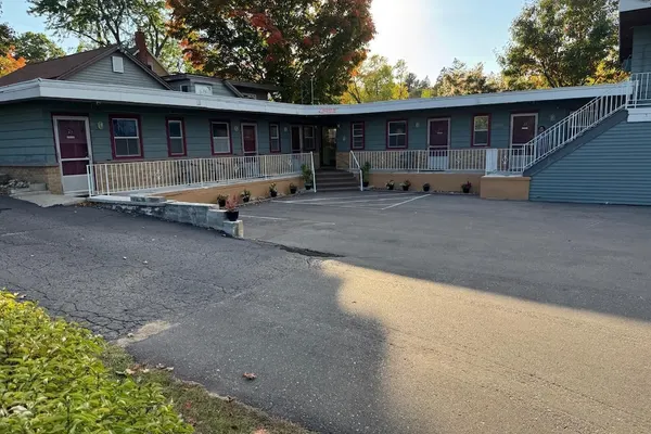 Photo 1 - Economy Inn Cadillac MI by Hotel O