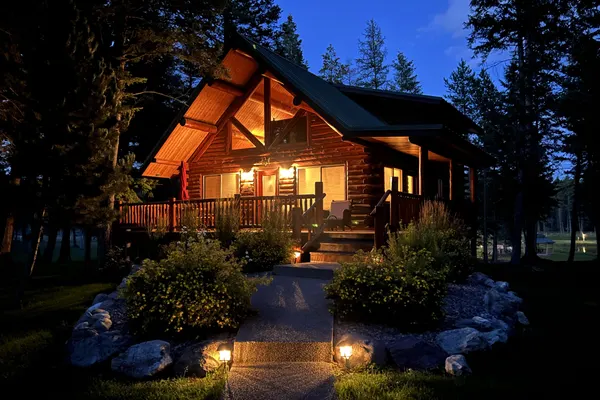 Photo 1 - Log cabin with fireplace, minutes from skiing, snowmobiling, xc ski, and more!