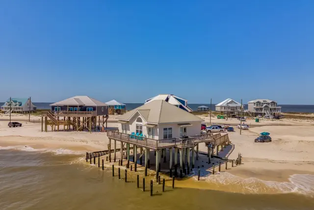 Photo 1 - Villa Delphinus - Beachfront! and Pet Friendly! Feel the ocean breezed and hear the waves lapping right at your doorstep!