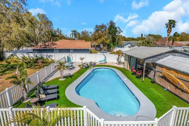 Photo 1 - Huge 8BR Stay | Heated Pool, Game Room, Near Beach