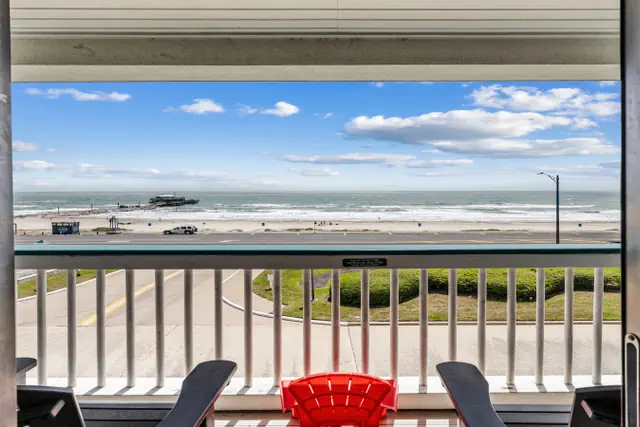 Photo 1 - Beachfront View | Top Floor| Heated Pool| Luxury