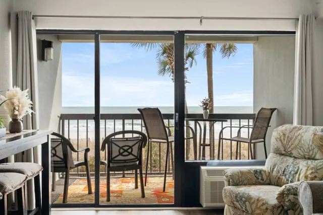 Photo 1 - Savoy at Grande Cayman Unit 102