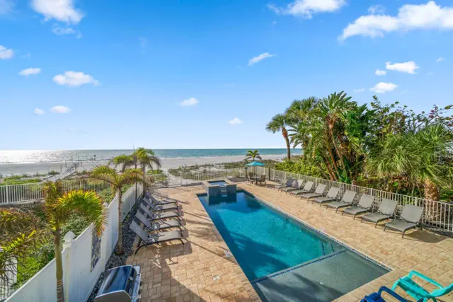 Photo 1 - Four Shores #2 Sunset Condo Direct Gulf w Pool&Spa