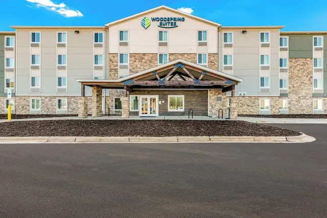 Photo 1 - WoodSpring Suites Charlotte - University Research Park