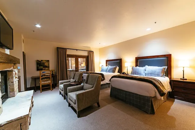 Photo 1 - Deluxe Two Queen Room With Fireplace Hotel Room by RedAwning