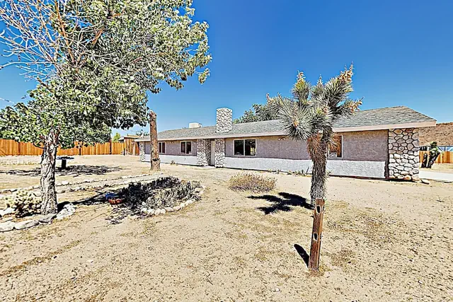 Photo 1 - Rawhide Ranch - Walk To Pappy And Harriet's With Hot Tub! 3 Bedroom Home by RedAwning