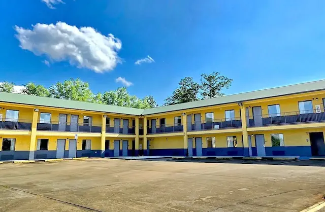 Photo 1 - Garden Inn & Suites
