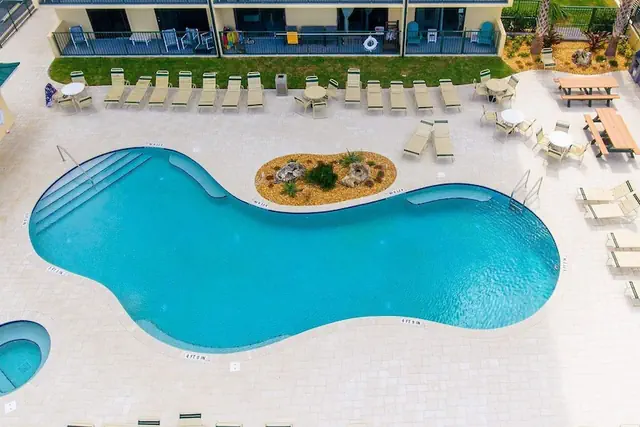 Photo 1 - Top Floor Oceanfront Condo w Pool Beach Access