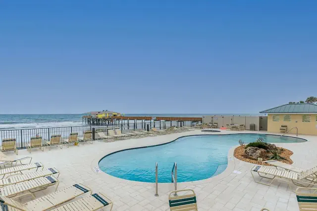 Photo 1 - Top Floor Oceanfront Condo w Pool Beach Access