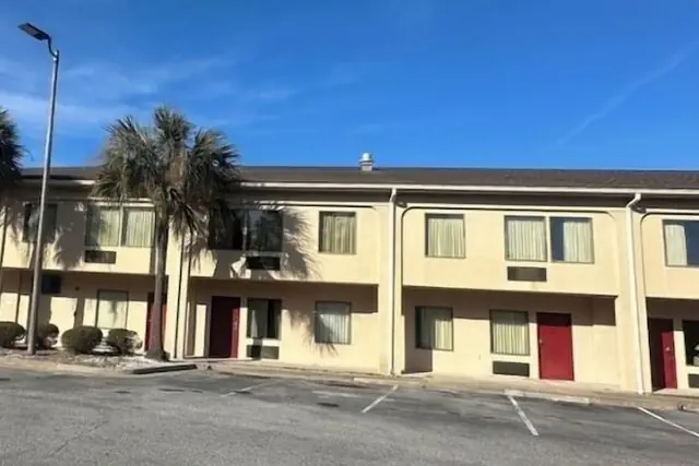 Photo 1 - GUEST COTTAGES & SUITES