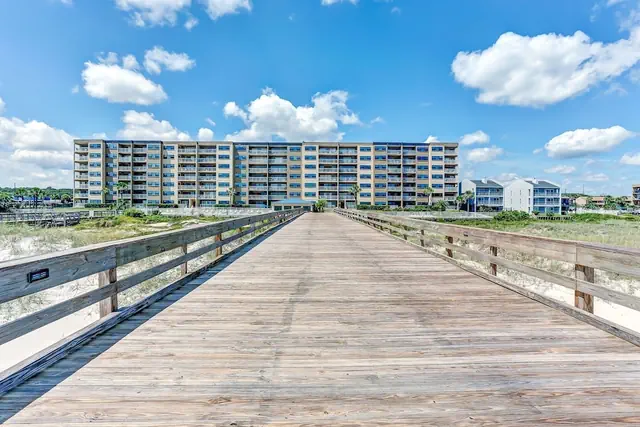Photo 1 - Beachfront Family Condo w/ Pool, Fishing, and Pier Access Amelia by the Sea