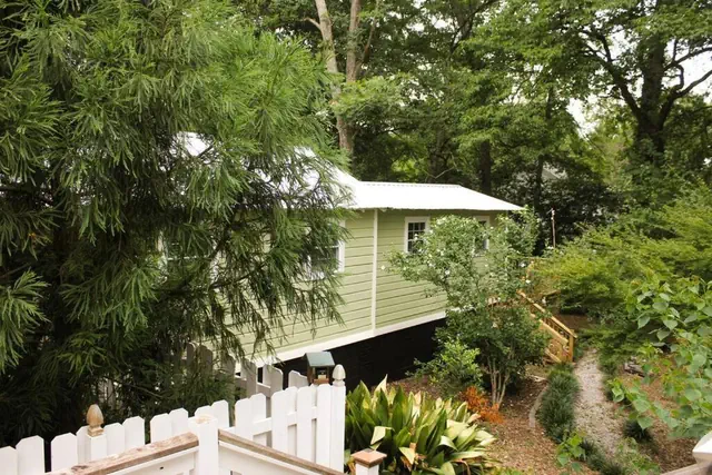 Photo 1 - The Greenhouse Cozy Cottage- Walk to Downtown!