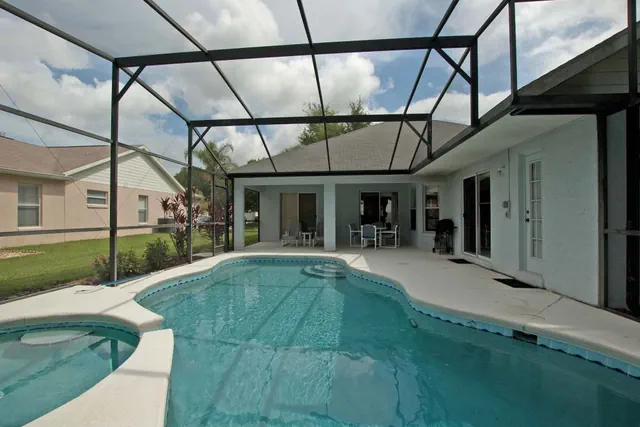 Photo 1 - 4BR Disney-Area Pool Home | BBQ Grill | Dog Friendly | Free WiFi